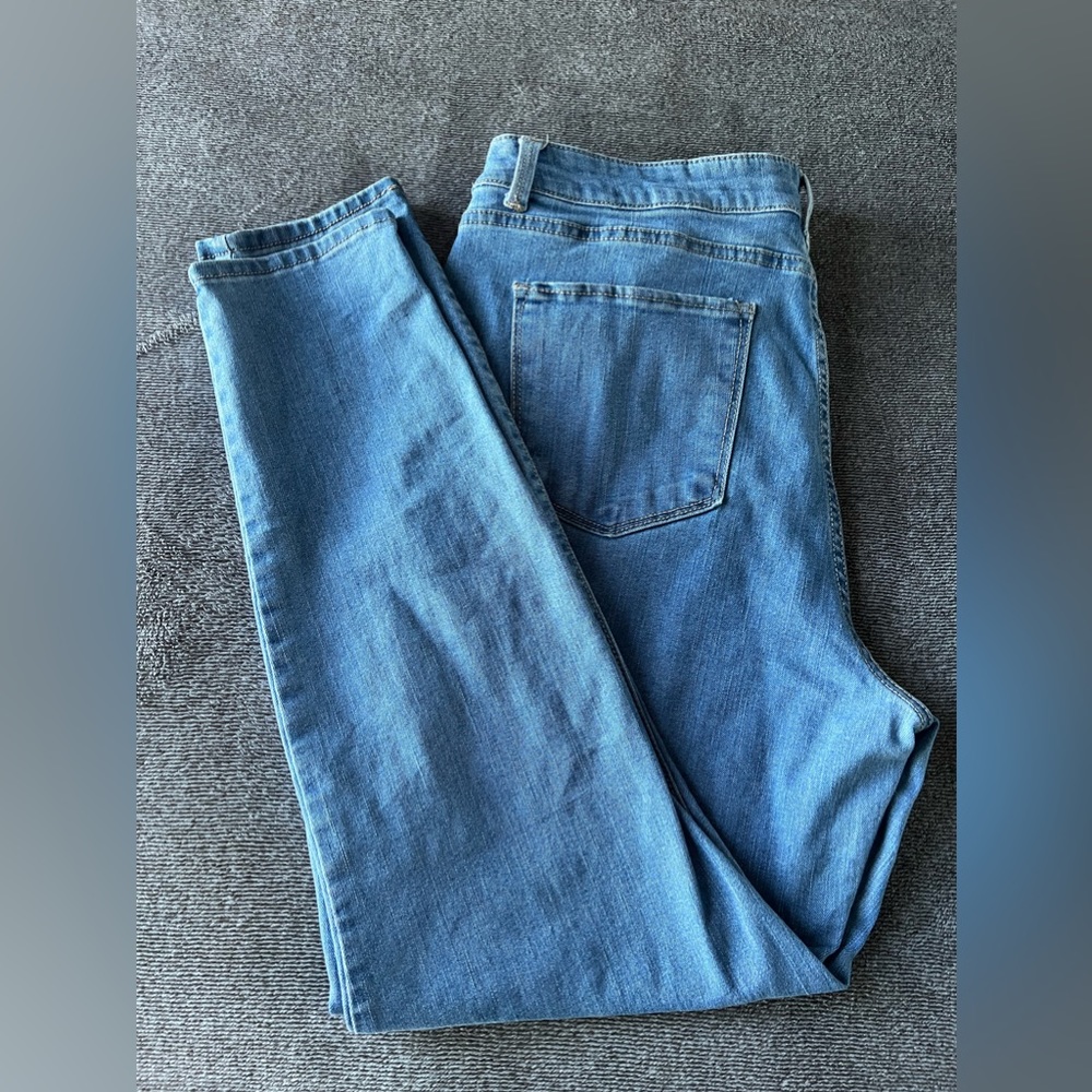 “No Boundaries” light and dark blue jeans